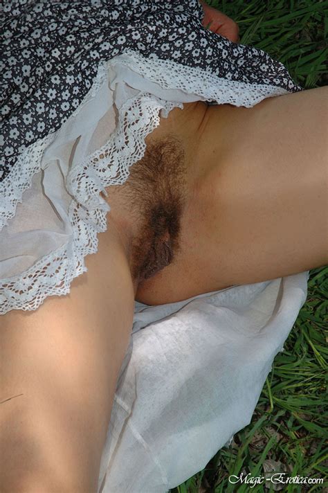 sexy brunette shows her hairy pussy in the forest pichunter