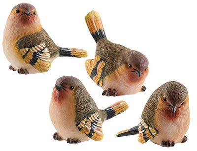 small finch bird figurine  weed patch