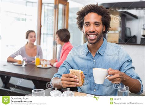 Handsome Man Eating A Sandwich Stock Image Image Of Adult Length