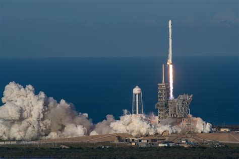 spacex successfully launches lands recycled falcon  rocket nbc news