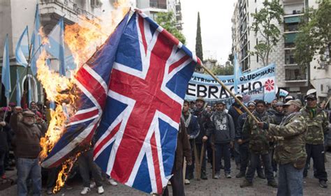 argentines burn union flag  protest  falkland islands military