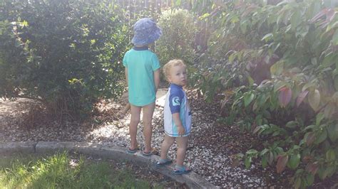 boys   boys cillian instructing lorcan   pee outdoors