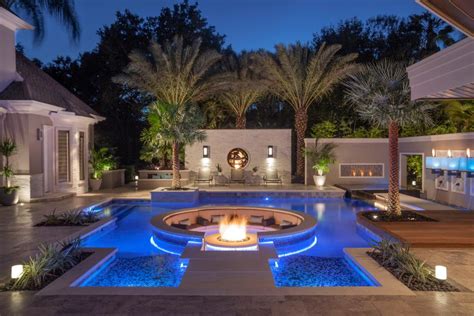 tropical pool  sunken fire pit seating area hgtv