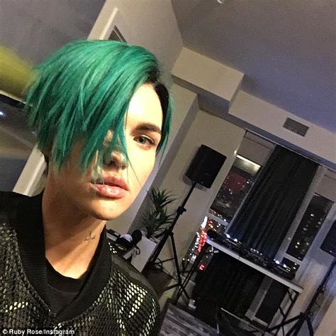 ruby rose shows off bright green hair as she films scenes