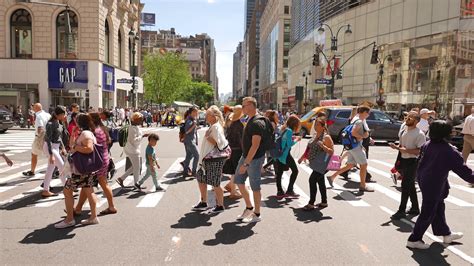 diverse people crossing street   york city stock video footage