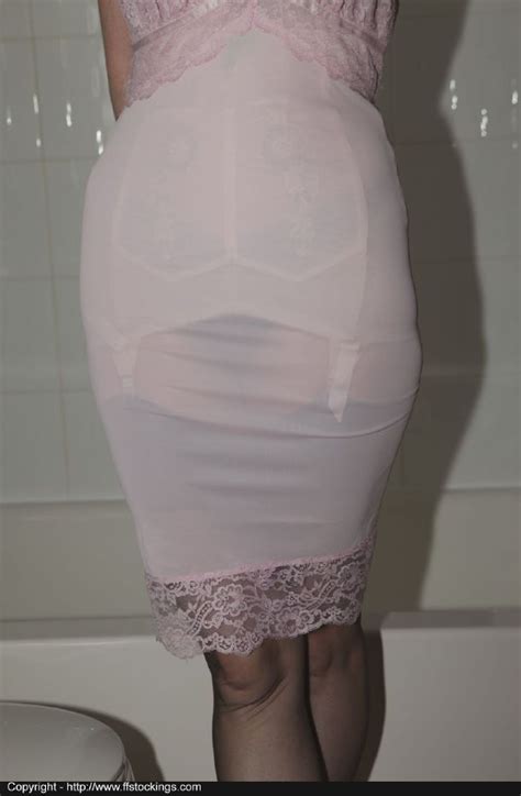 wet petticote showing  girdle  garters   suspender bumps