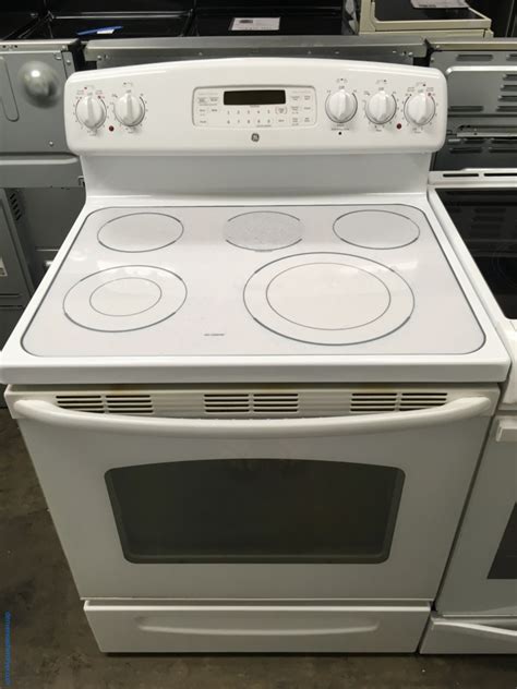 large images  electric ge white range glass top  cleaning  burners proof feature