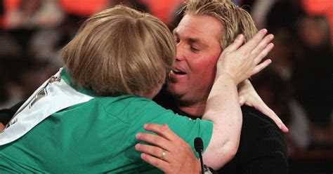 you won t believe who s trying to kiss and cuddle shane warne now