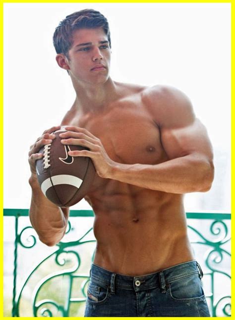 Shirtless Hunk In Jeans With 6 Pack Abs Holding Football Hot Muscle