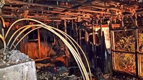 woman  escapes fire  destroys mobile home