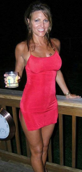 handsome sexy milf in attractive red tight dress show her