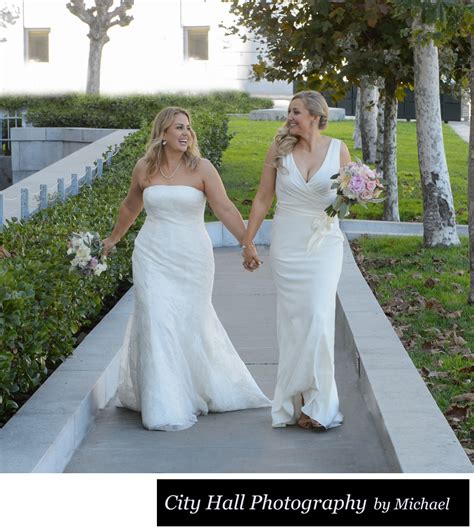 Lesbian Wedding Holding Hands Walking In San Francisco