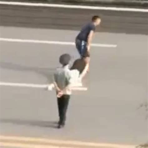 Horrifying Video Shows Woman Dragged By Hair Across Road