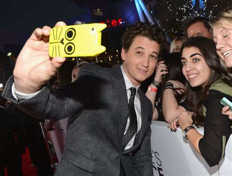 miles teller grabbed a cat covered phone for a fan selfie
