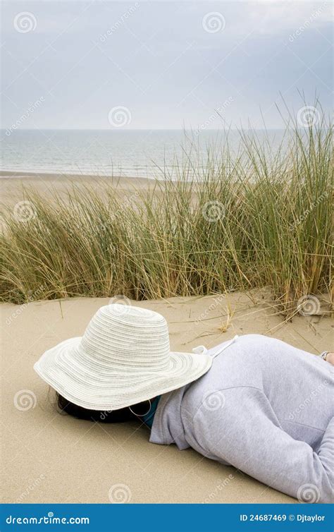 woman sleeping  beach stock image image  sand coast