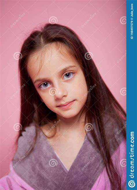Long Haired Girl With Big Eyes In A Pink Bathrobe Stock Image Image