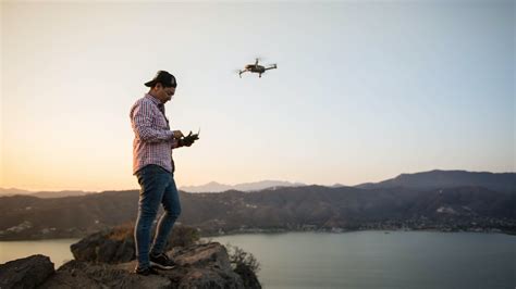 man flying  drone  stock photo