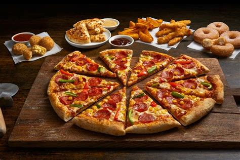 dominos plans  increase uk stores