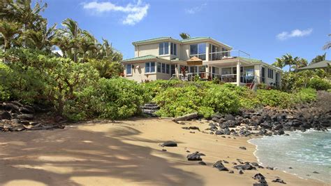 islands magazine   names sandy beach house  top  villa