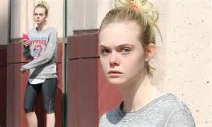 elle fanning hits the gym in a rolling stones tour tee daily mail online