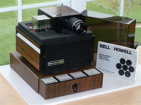 Bell And Howell Model Rc 50 Slide Cube Projector With Remote
