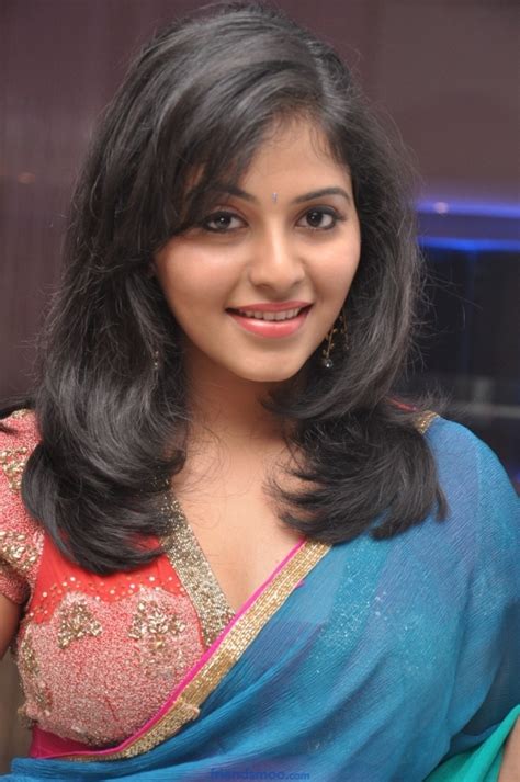 south indian actress cute anjali latest stills in blue saree 9