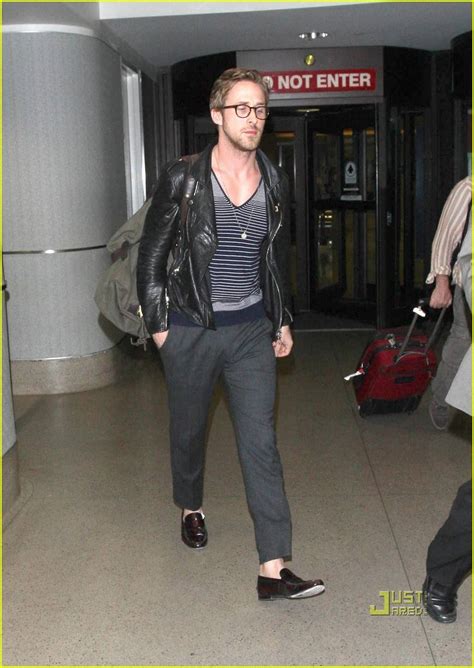 A Bespectacled Ryan Gosling Touches Down At Lax Looking