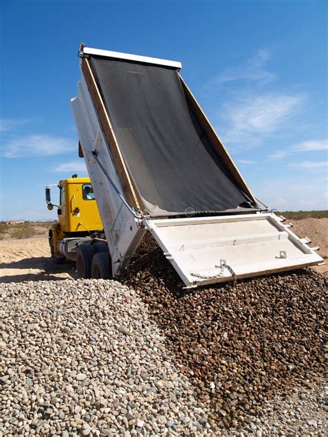 truck dumping gravel stock image image  laborers park