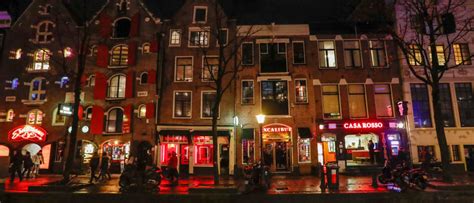 tourists face fines if caught staring at amsterdam s sex