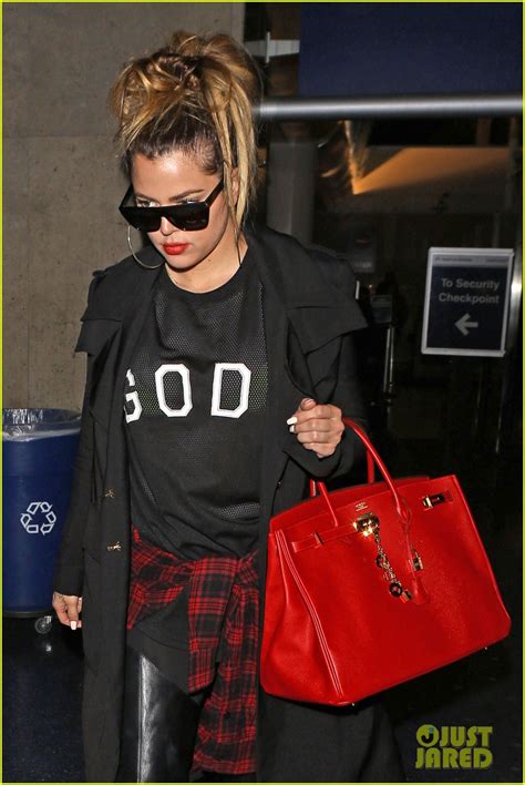 Khloe Kardashian Rocks Sheer Top For Late Night Lax Arrival Photo