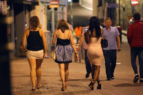 a night out in magaluf uk crowds of teens swig vodka in newquay