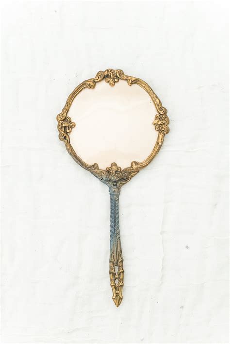 antique gold hand mirror