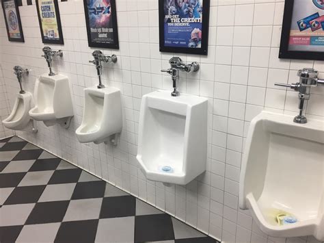 this movie theatres bathroom had five different make and models of