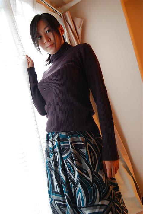 Asian Milf Ryoko Morikawa Undressing And Exposing Her Hairy Gash In