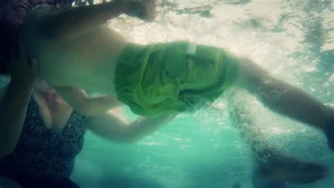 people swimming in a hotel swim pool underwater shot stock footage video 4364153 shutterstock