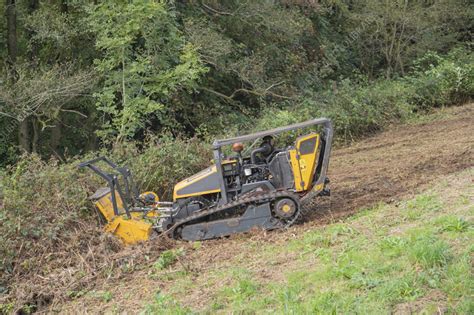 robocut remotely controlled tracked mower cutting bramble stock image  science