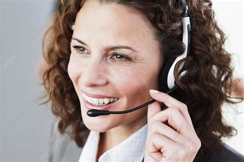 female call center agent talking stock image  science