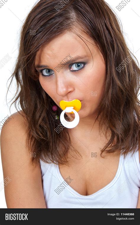 girl sucking pacifier image and photo free trial bigstock