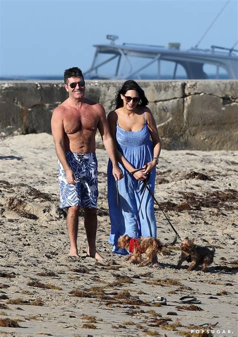 simon cowell and lauren silverman on the beach after birth popsugar