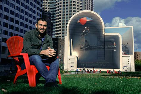 iranian artist mehdi ghadyanloo sits in front of his mural spaces of hope on the rose kennedy