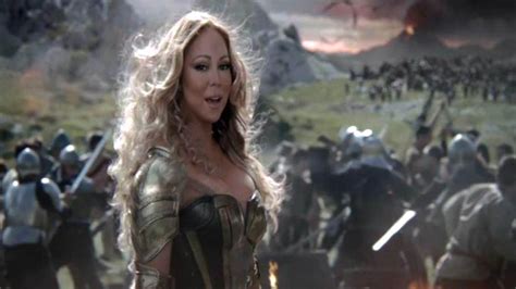 8 questions we have about mariah carey s game of war commercial