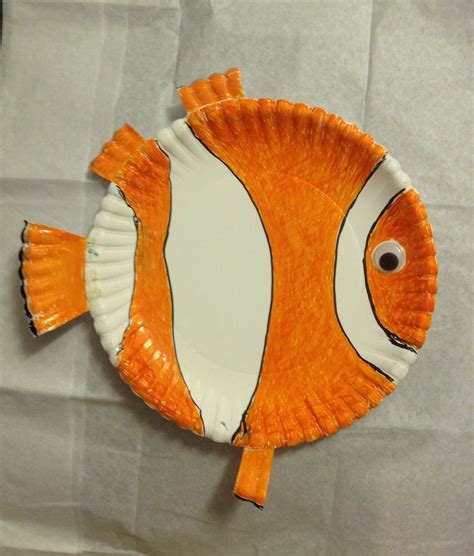 orange  white paper plate   fish   side   shaped   clownfish
