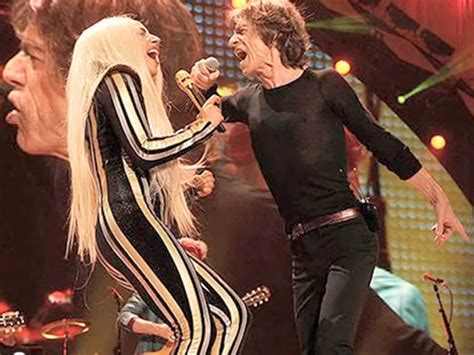 lady gaga takes shelter with rolling stones at new jersey