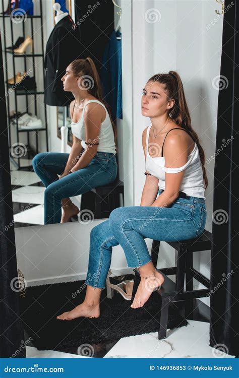 shot of a beautiful woman in the fitting room stock image image of