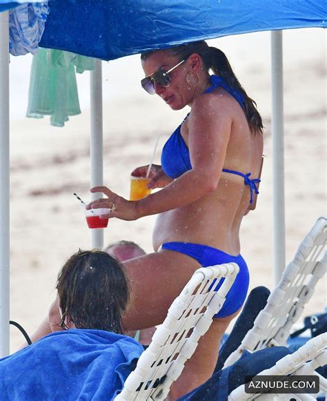 coleen rooney pictured soaking up the sun while enjoying