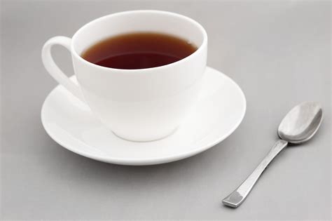 generic white cup  hot black tea  stock image