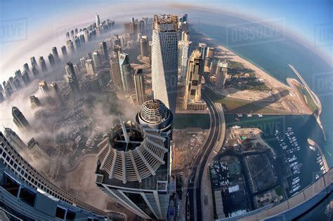 aerial view  cityscape  skyscrapers   clouds  dubai united arab emirates