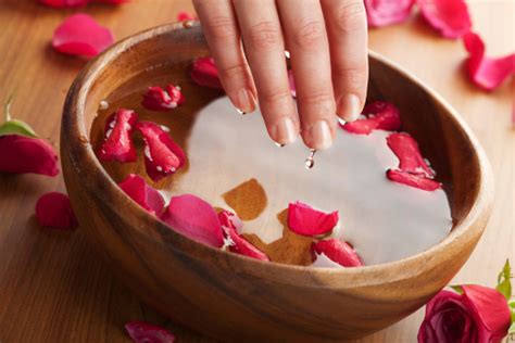 woman receiving  hand spa treatments stock photo  image