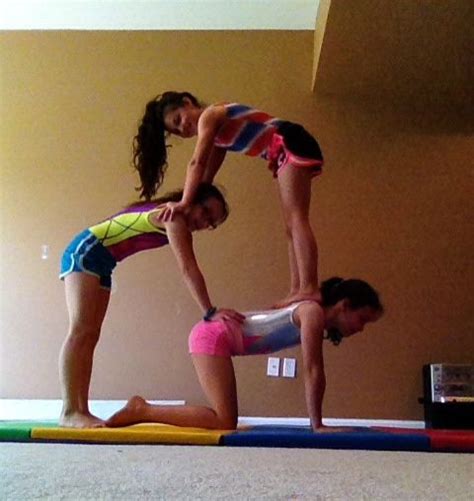 person acro stunts partner yoga poses  person yoga poses acro