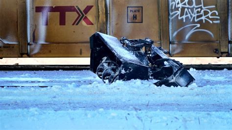 sidewalk snowplow driver dead  colliding  cn train london